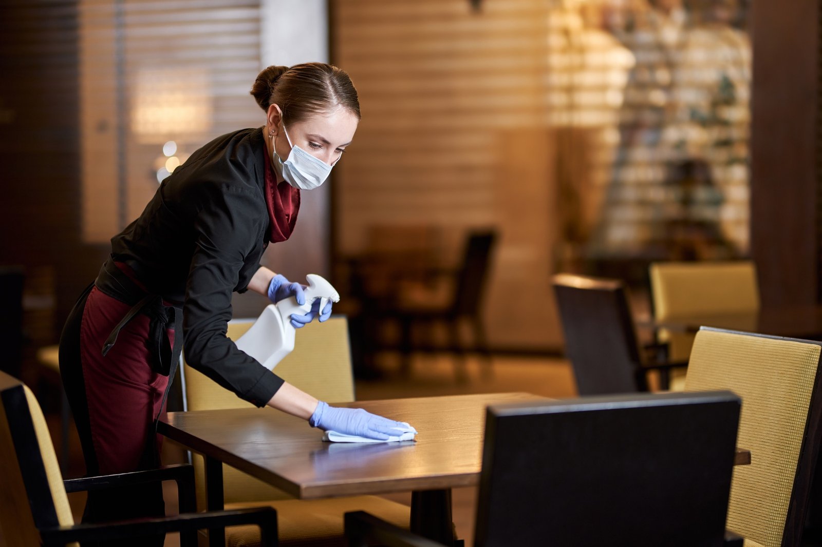 Dutiful restaurant staff being responsible about cleaning and sanitation